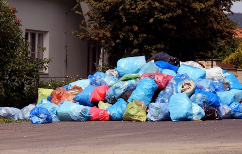Professional waste management team handling construction debris